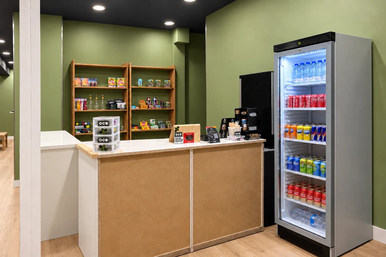 Weed Club Chueca counter with wooden shelves and a drinks refrigerator